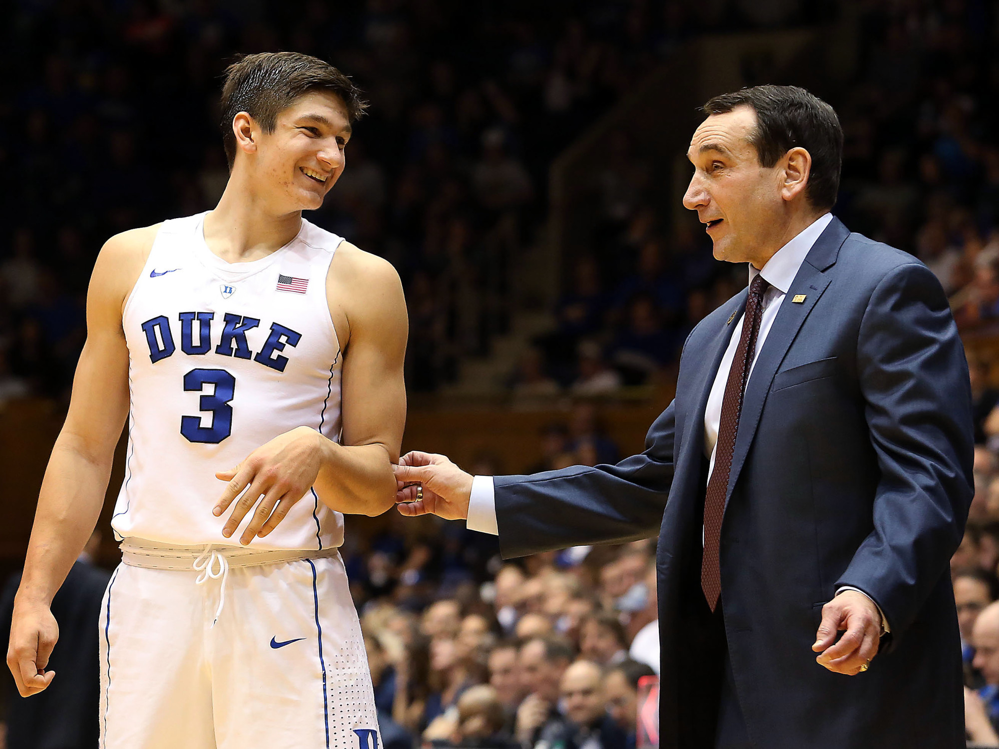 Nov 29, 2015; Durham, NC, USA; Duke Blue Devils head coach Mike Krzyzewski talks with guard Grayson Allen (3) from the sidelines in their game against the Utah State Aggies at Cameron Indoor Stadium. Mandatory Credit: Mark Dolejs-USA TODAY Sports