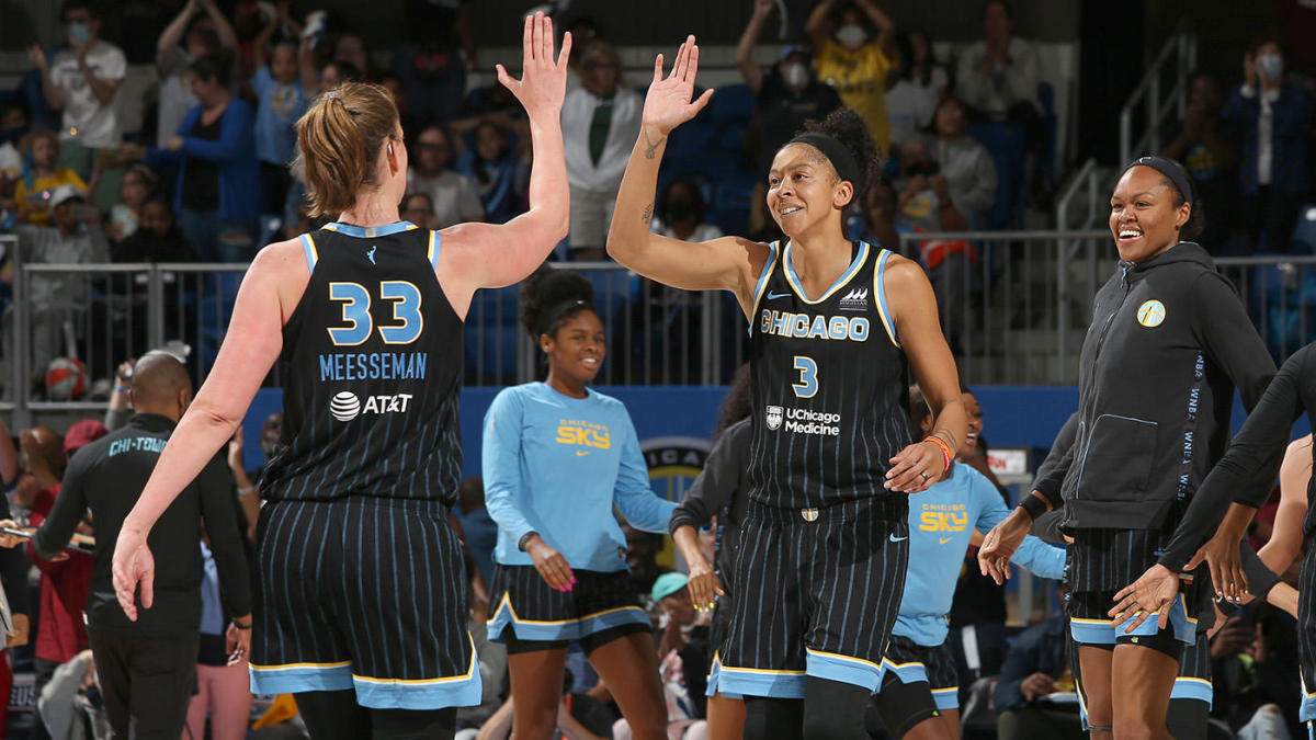 CHICAGO, IL - AUGUST 20: Emma Meesseman #33 of the Chicago Sky high fives Candace Parker #3 of the Chicago Sky during Round 1 Game 2 of the 2022 WNBA Playoffs on August 20, 2022 at the Wintrust Arena in Chicago, Illinois. NOTE TO USER: User expressly acknowledges and agrees that, by downloading and or using this photograph, user is consenting to the terms and conditions of the Getty Images License Agreement.  Mandatory Copyright Notice: Copyright 2022 NBAE (Photo by Gary Dineen/NBAE via Getty Images)