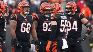 Bengals linebacker Logan Wilson in a huddle with the defense