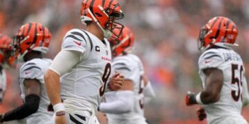 Cincinnati Bengals quarterback Joe Burrow (9) jogs off the field after a stalled drive in the second quarter of an NFL football game between the Cincinnati Bengals and Cleveland Browns, Sunday, Sept. 10, 2023, at Cleveland Browns Stadium in Cleveland. Kareem Elgazzar/The Enquirer