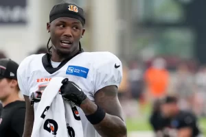 Cincinnati Bengals wide receiver Tee Higgins (5) wipes his face between reps during a preseason training camp practice at the Paycor Stadium training facility in downtown Cincinnati on Wednesday, Aug. 16, 2023. Sam Greene/The Enquirer