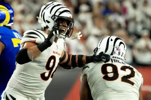 Cincinnati Bengals defensive end Trey Hendrickson (91) celebrates after sacking Los Angeles Rams quarterback Matthew Stafford (9) in the third quarter of the NFL game between the Cincinnati Bengals and Los Angeles Rams at Paycor Stadium in Cincinnati on Monday, Sept. 25, 2023.