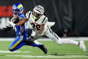 Cincinnati Bengals cornerback DJ Turner II (20) defends a pass intended for Los Angeles Rams wide receiver Tutu Atwell (5) in the fourth quarter during a Week 3 NFL football game between the Los Angeles Rams and the Cincinnati Bengals, Monday, Sept. 25, 2023, at Paycor Stadium in Cincinnati.