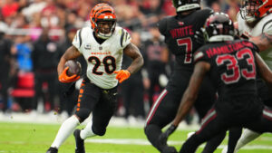 GLENDALE, AZ - OCTOBER 08: Joe Mixon #28 of the Cincinnati Bengals carries the ball against the Arizona Cardinals during the first half at State Farm Stadium on October 8, 2023 in Glendale, Arizona. (Photo by Cooper Neill/Getty Images)